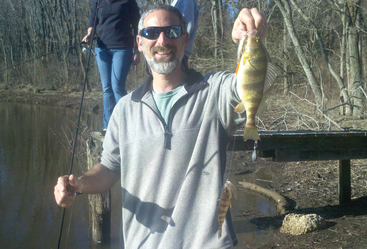 Lenny Rudow with a pair of yellow perch