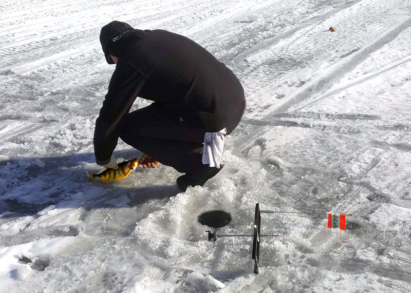 ice fishing with a tip-up