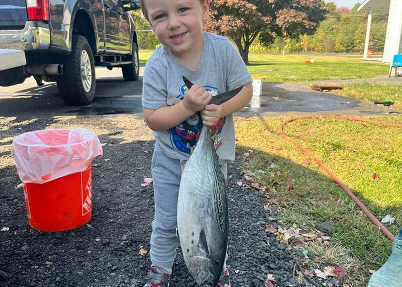 kid holding an albie