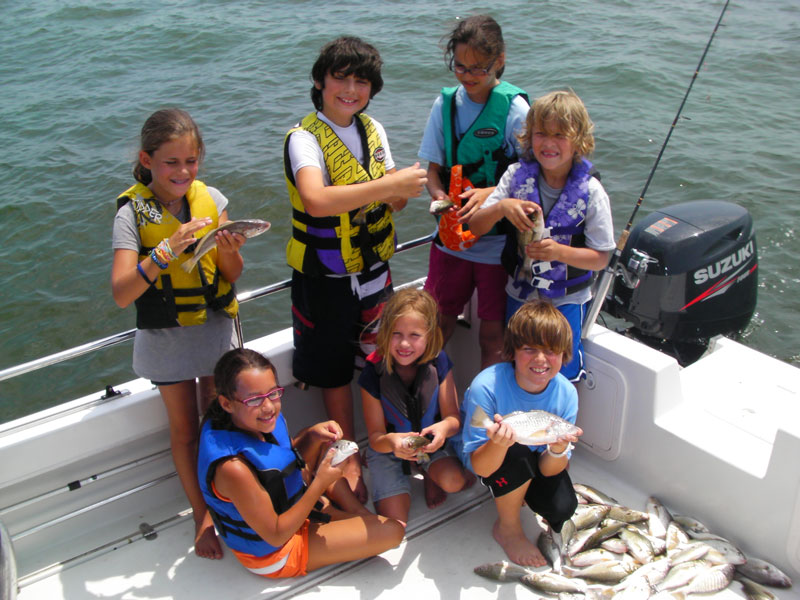 kids go bottom fishing and catch a ton of fish