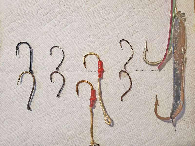 rusty fish hooks and new fish hooks