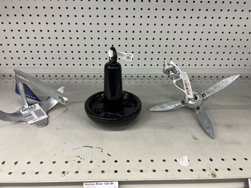 an assortment of kayak anchors