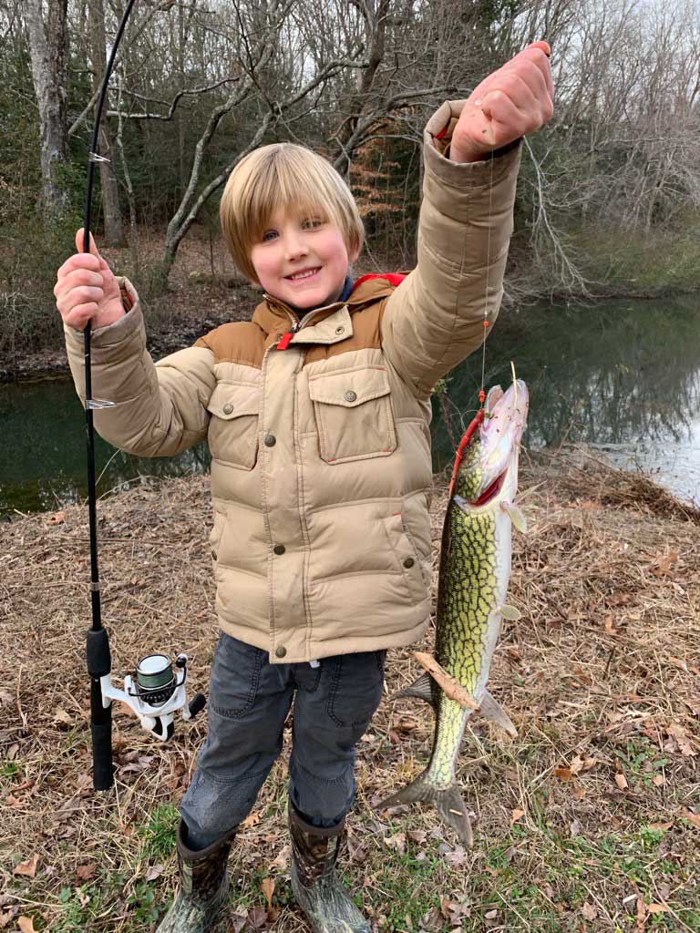 youth fishing for chain pickerel
