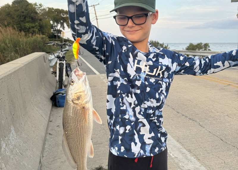 kid caught a red drum