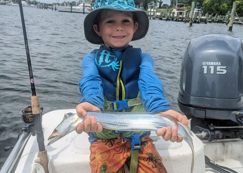 angler with a ribbonfish