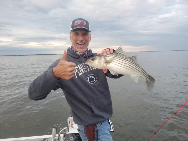 happy angler with fish