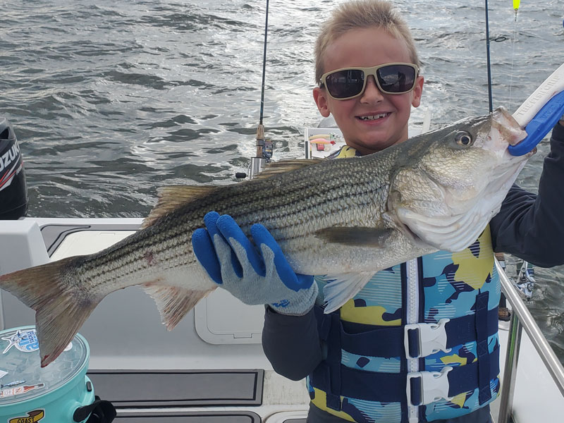 jase with a rockfish