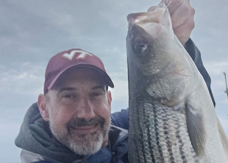 upper bay angler with a rockfish