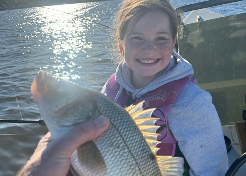 angler with a chesapeake bay white perch