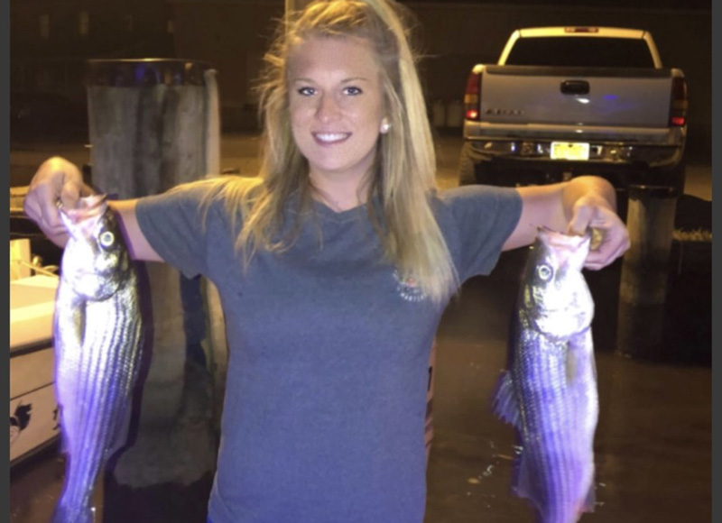 woman with striped bass