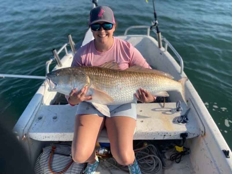 angler with a huge redfish